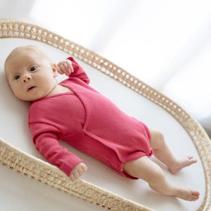 Body incrociato a maniche lunghe traforato con cuori 100% cotone neonato Fucsia