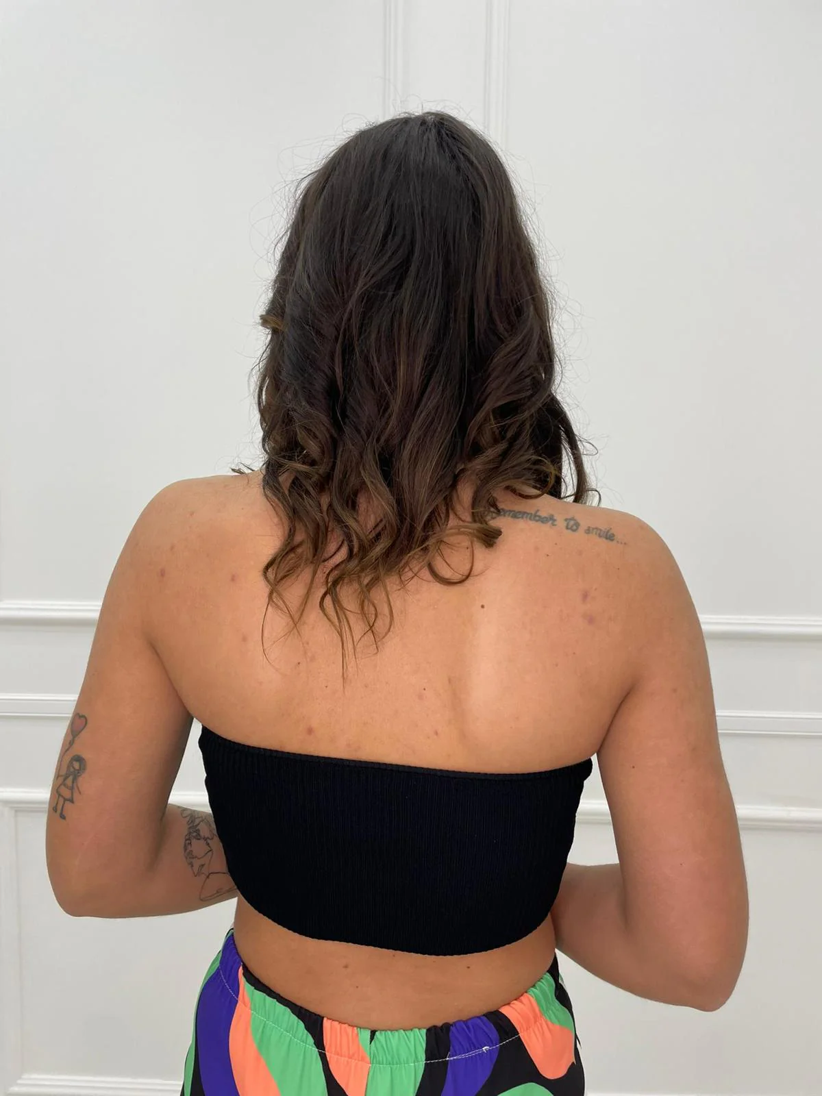 Top a costine con zip - immagine 6