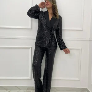 Tailleur in paillettes con pantalone a zampa