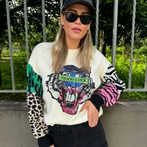 Maglione con stampa avanti e maniche particolari