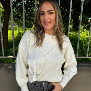 Maglione tinta unita con taschino sul lato