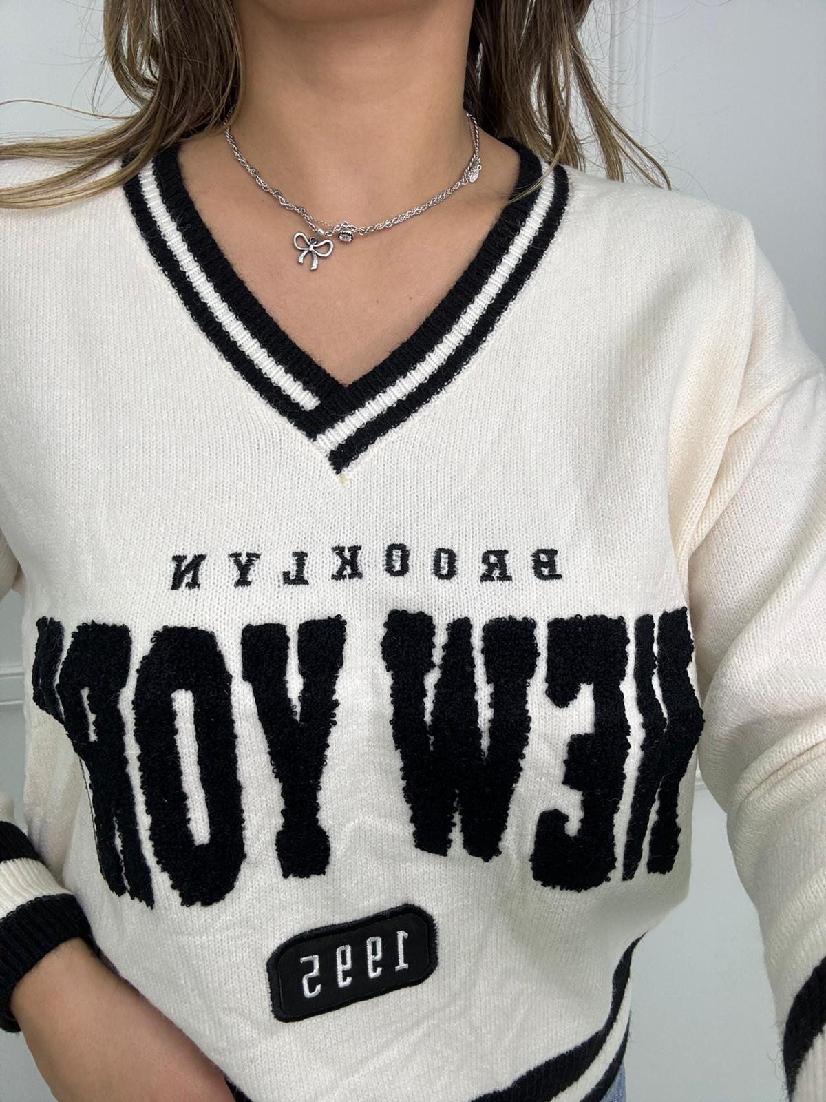 Maglione New York con scollo a V - immagine 6